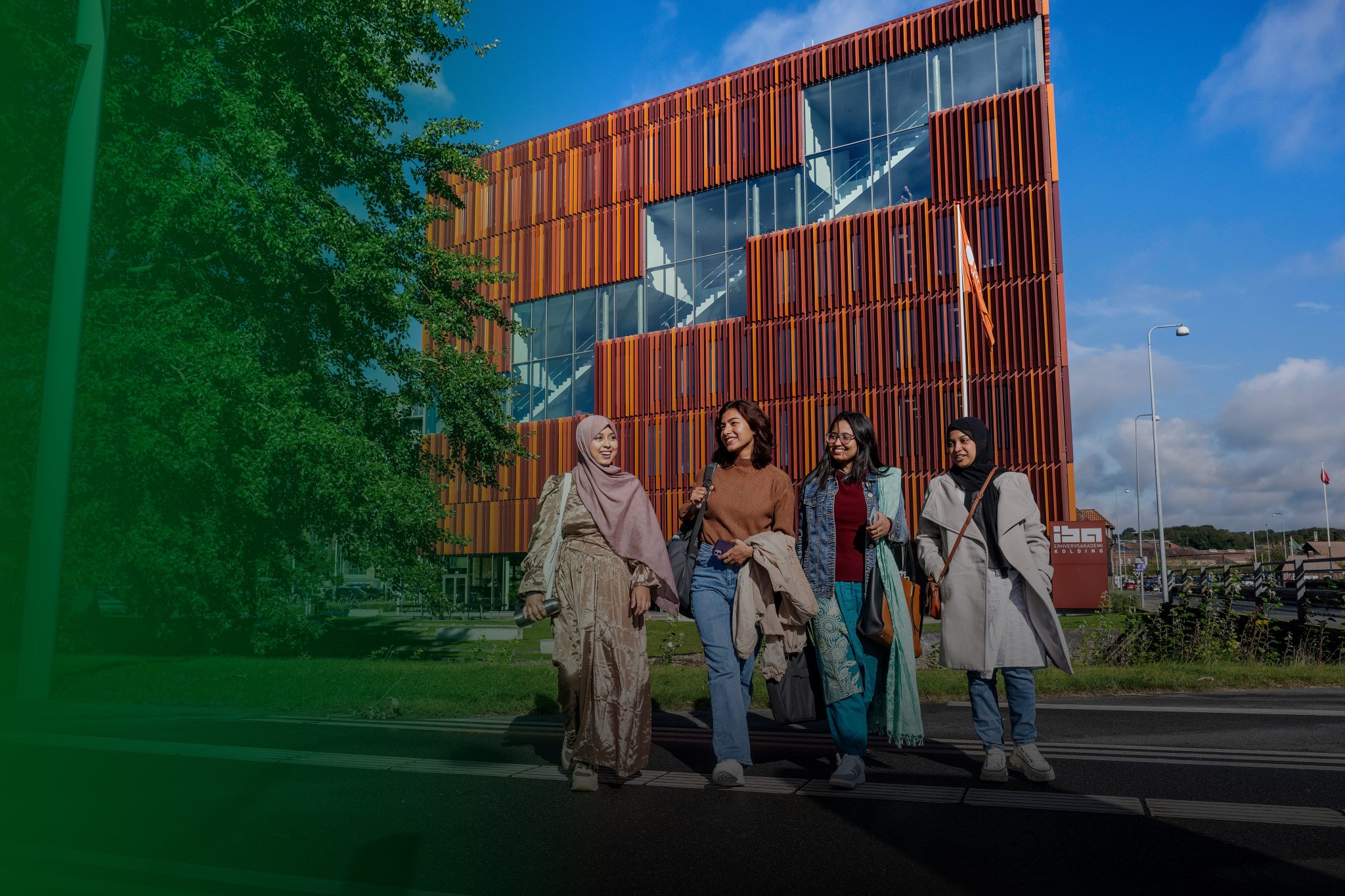 Students walking in front of the IBA building