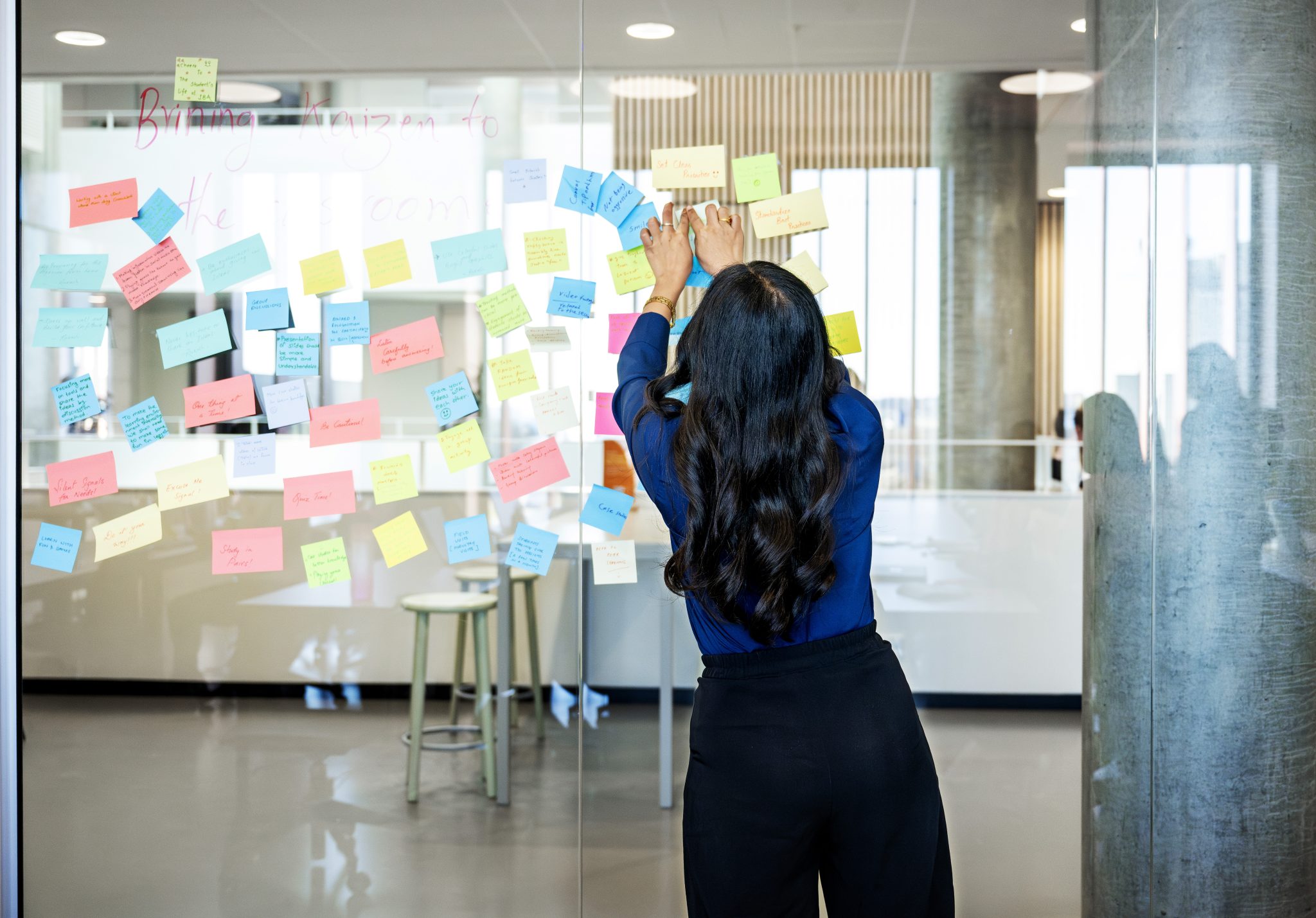 Photo of af girl hanging post its